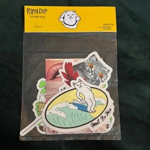 Ripndip Sticker Pack with Surfing Cat and Floral Art